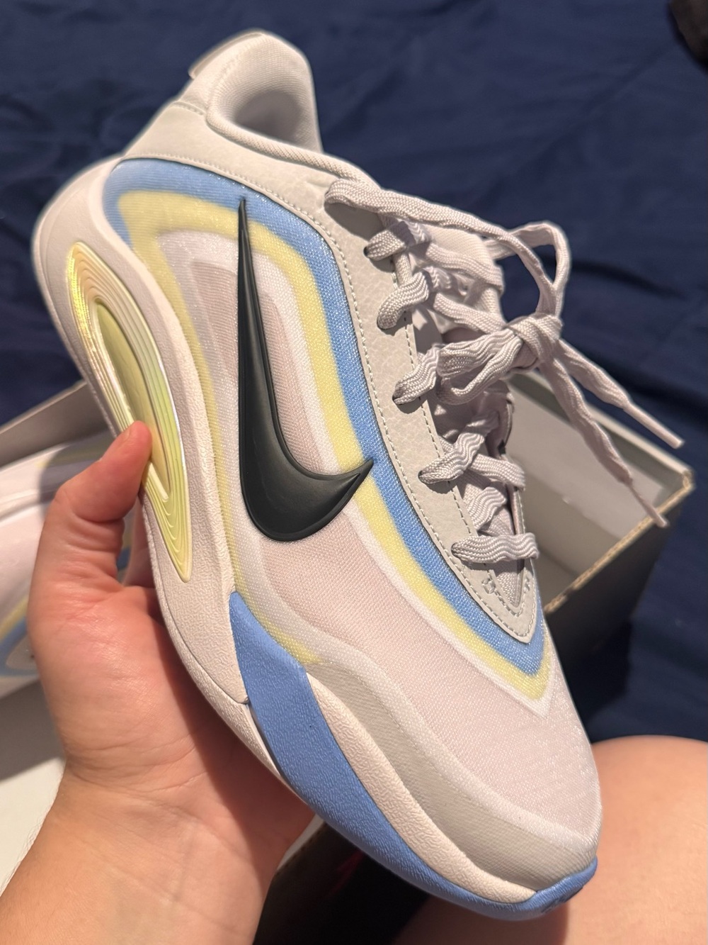 Nike Women’s White Sneakers with Light Blue & Yellow Accents
